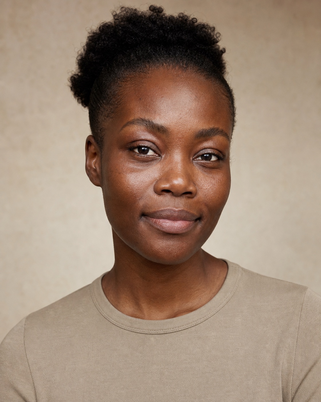 Black woman with deep dark skin and natural texture